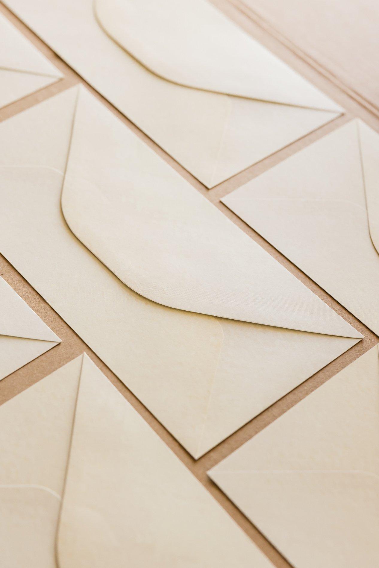 Envelopes Laid Out on Brown Background